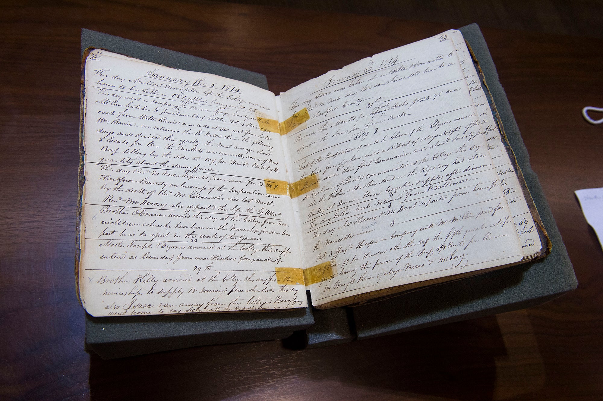 Historical booklet displayed with its pages open